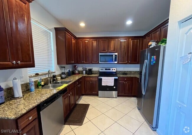 Building Photo - 7029 Ambrosia Ln Rental