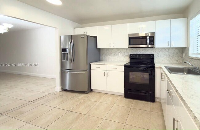 Photo - 609 S State Rd 7 Unit 1C