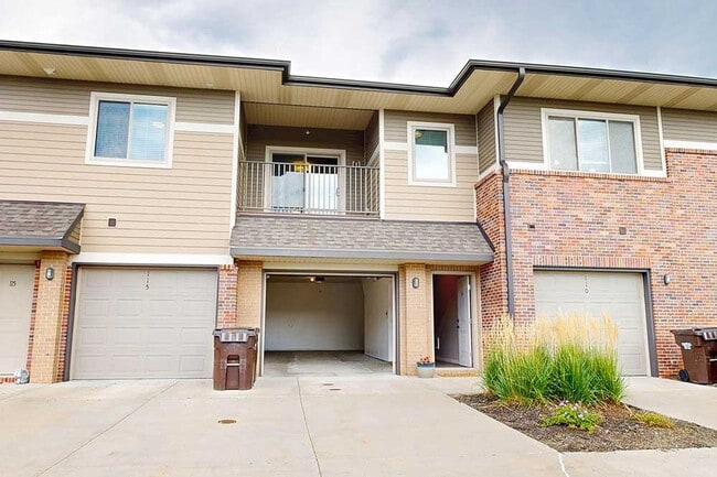 Enjoy the convenience of an attached garage, offering covered parking and extra storage space.