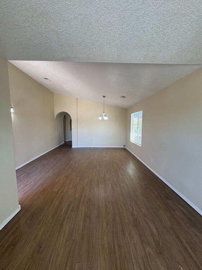 Photo - 4 bed 2 bath home! Fresh New Paint & Flooring Throughout