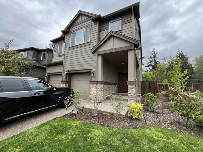 Photo - Open Concept 4BR Home with Island Seating, Loft & Spacious Living Room