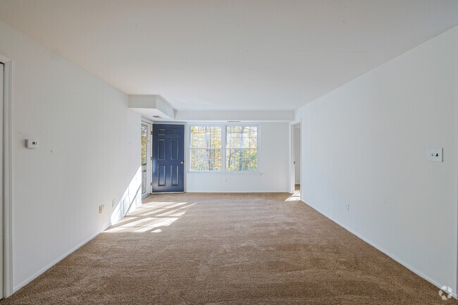 2BR, 1BA - 782SF - Living Room W/ Balcony Door