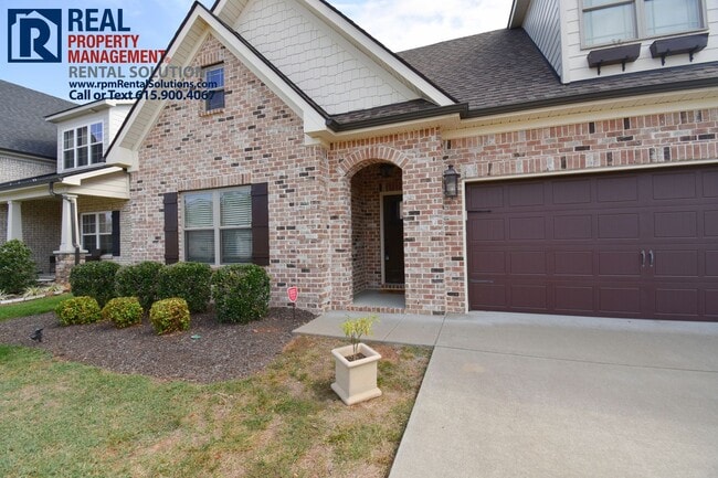 Building Photo - All brick 4 bedroom home plus Bonus room! Garage and covered patio!