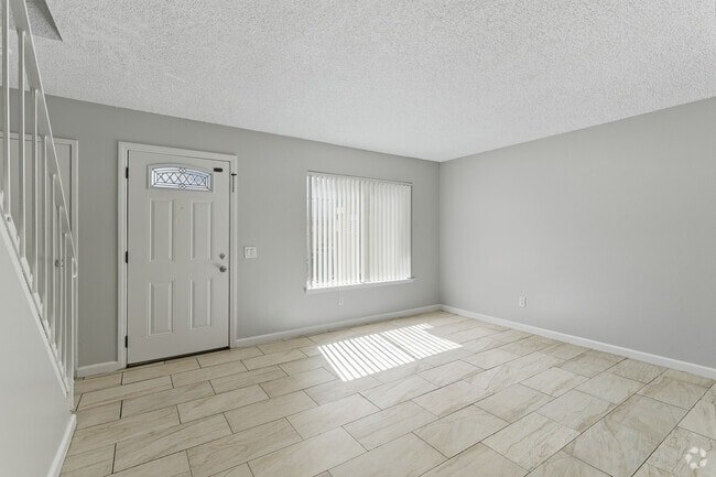 2BR, 1.5BA - 925SF - Living Room - Village Green