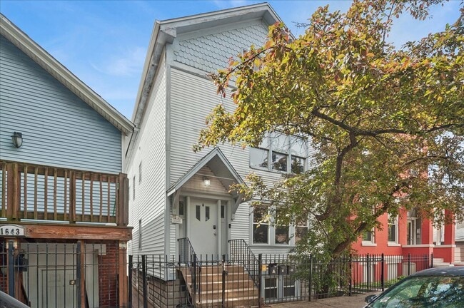Building Photo - 1645 W Beach Ave Unit 1