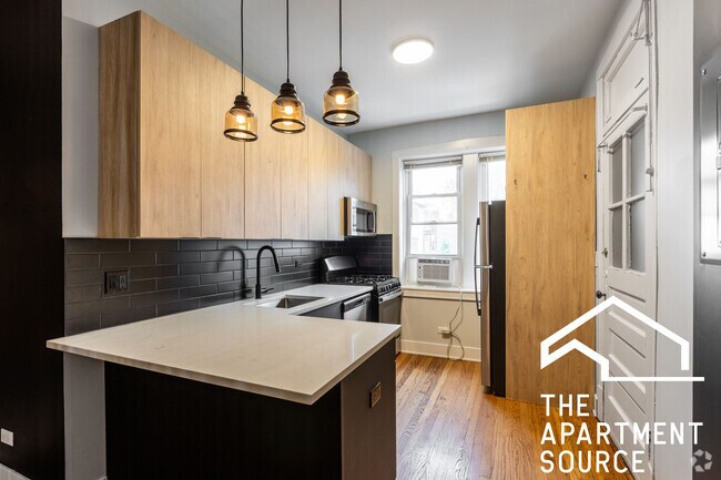 Building Photo - 4011 N Lowell Ave Unit 3W Rental