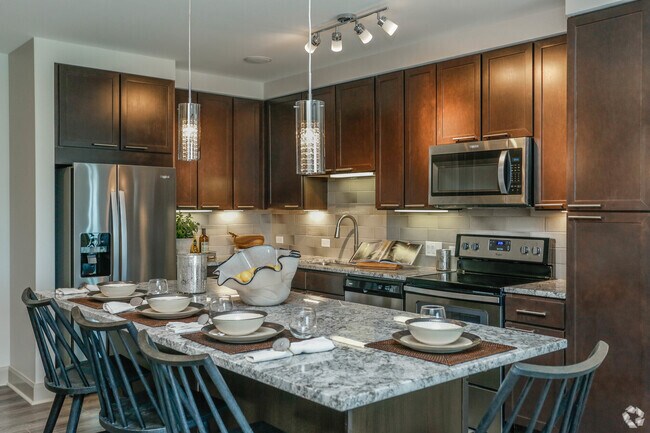 Building Photo - Your Dream Apartment Is Just a Tour Away! Unit MC1