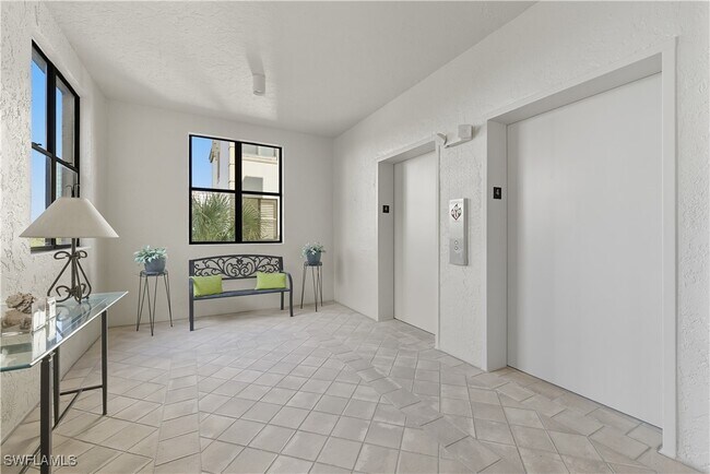 Building Photo - 7040 Pelican Bay Blvd Unit D401