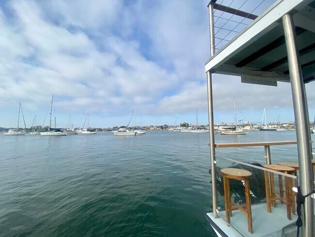 Sitting on your private dock - 311 E Edgewater Ave Unit A