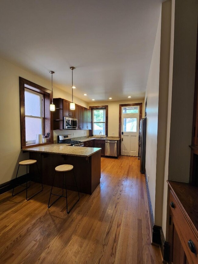 Building Photo - 6115 Pershing Ave Unit #1