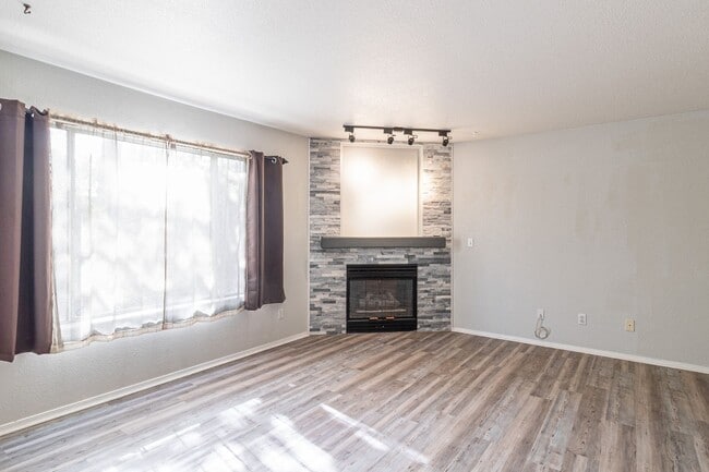 Photo - Charming 2-Bedroom Retreat with Fireplace & Private Covered Patio