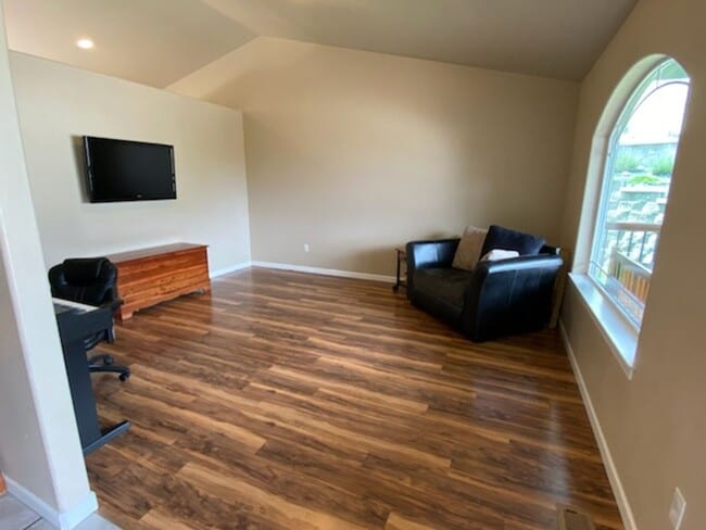 Photo - Sunny and spacious 3 bed, 2.5 bath house with living and family room, with huge back yard!