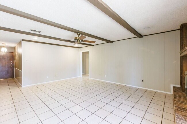 Photo - Charming 4-Bedroom Home with Cozy Fireplac...