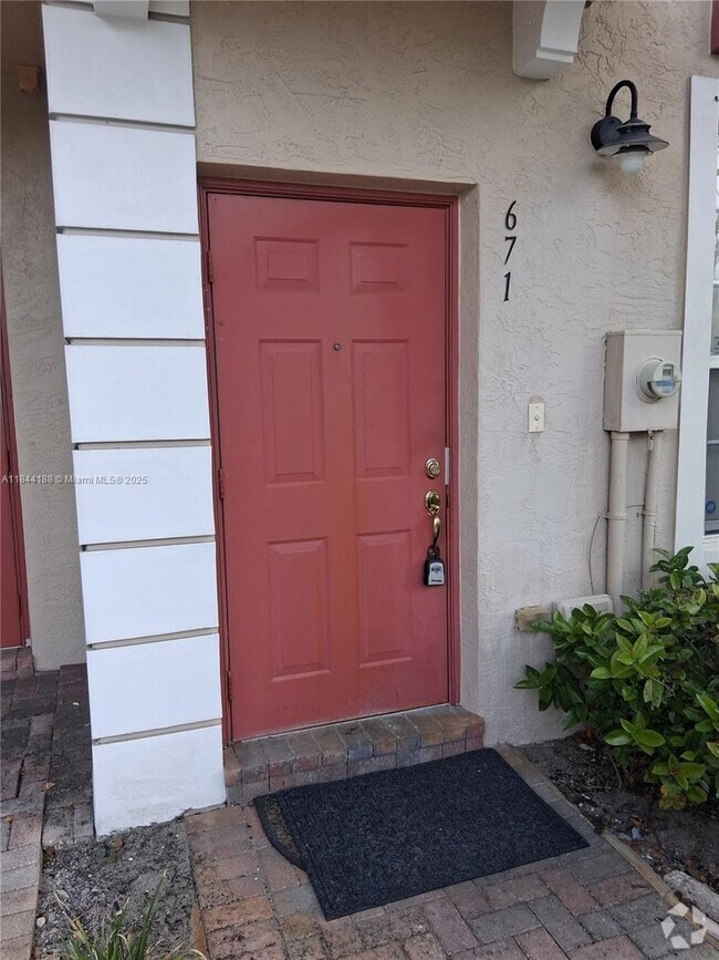 Building Photo - 671 NW 42nd Ave Rental