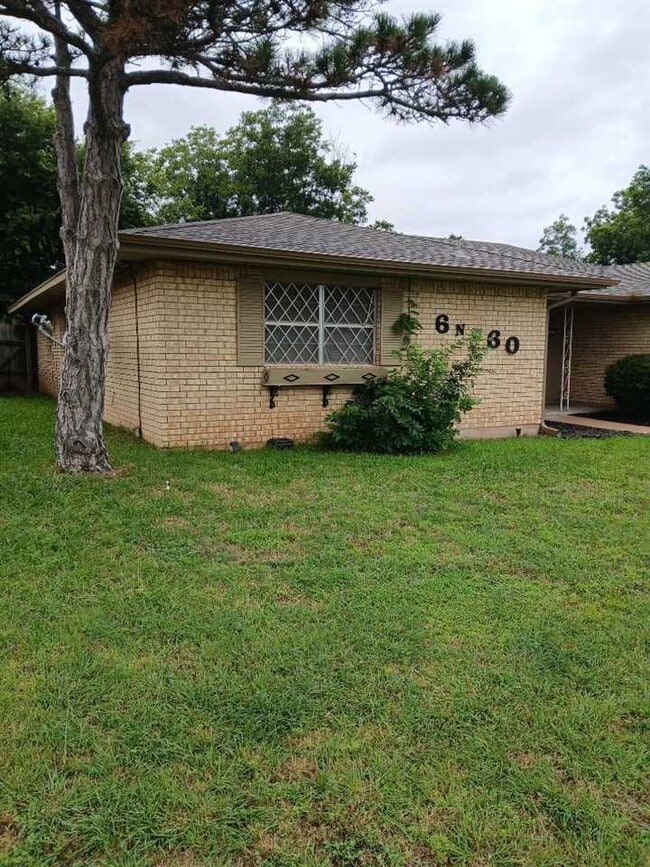 6 NW 60th St