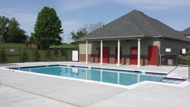 relax by the pool - Academy Park Apartments
