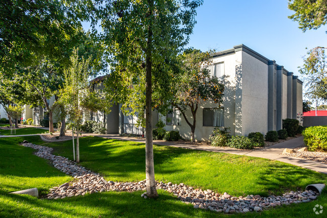 Lush Courtyard - North Country Club Apartments