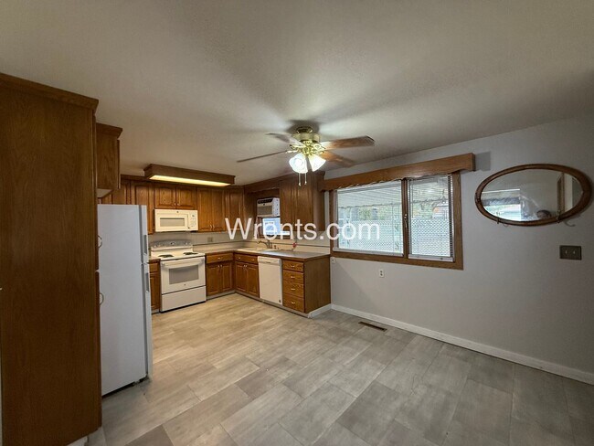 Photo - Now Available: Spacious 4-Bed, 2-Bath Home in Town & Country