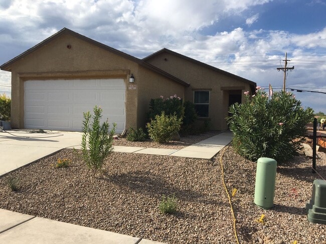 Building Photo - COMING SOON! New 3BR 2 BA Home w/ 2-Car Garage • Stainless Kitchen • Timer-Irrigated Yard in East...