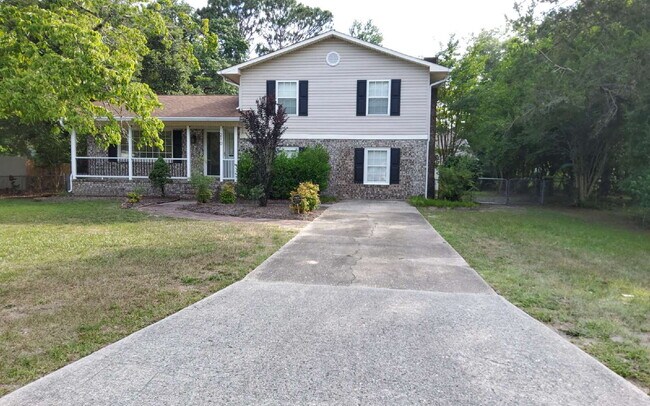 Photo - "Charming 3-Bed Oasis with Granite Touches & Cozy Fireplace on Spartan Road!"