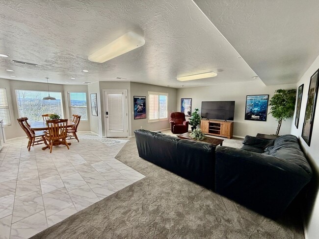 Photo - Furnished and Utilities Included: Two-Bedroom Basement Apartment with Private Yard