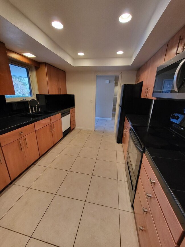 Photo - Lovely Brick House on the West side of tow...