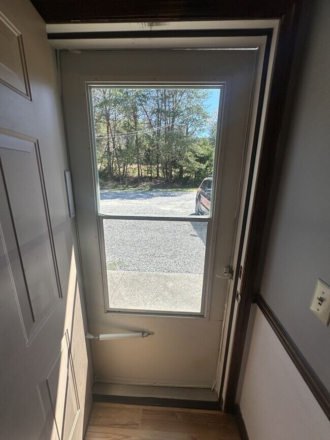 Photo - Charming, Light-Filled Retreat with Quiet Comfortable Living