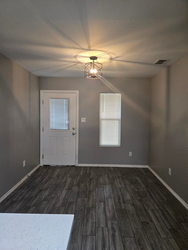 Dining room and backdoor - 1413 Glasscock Ave Unit A