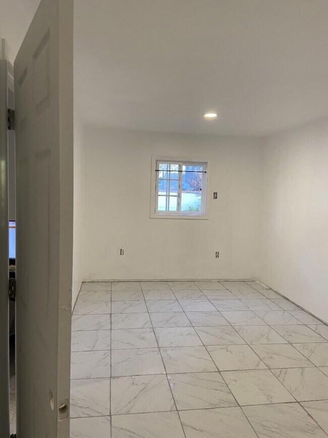 Room One - 4235 Elenda St