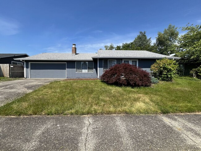 Photo - Charming Ranch Home with Sunroom or 4th Bedroom, Two-Car Garage and Fenced Backyard