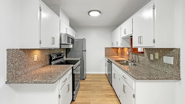 Photo - Waterfront Top-Floor West-Facing Apartment...
