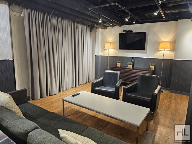 Sunlit 11th-Floor 1-Bed with Wall-to-Wall Windows in Lenox Hill