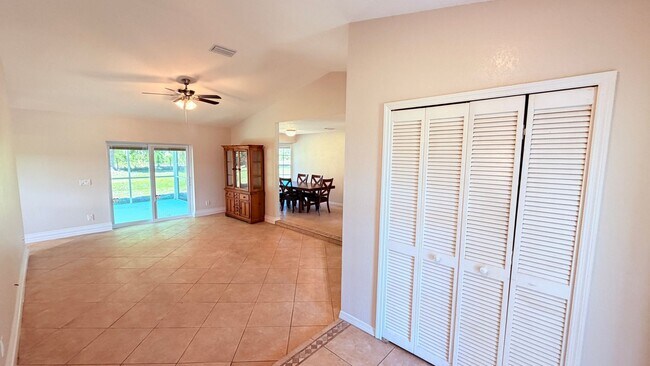 Photo - Bright & Spacious 3/2 Home with Huge Yard + Screened Patio — Lawn Care Included!