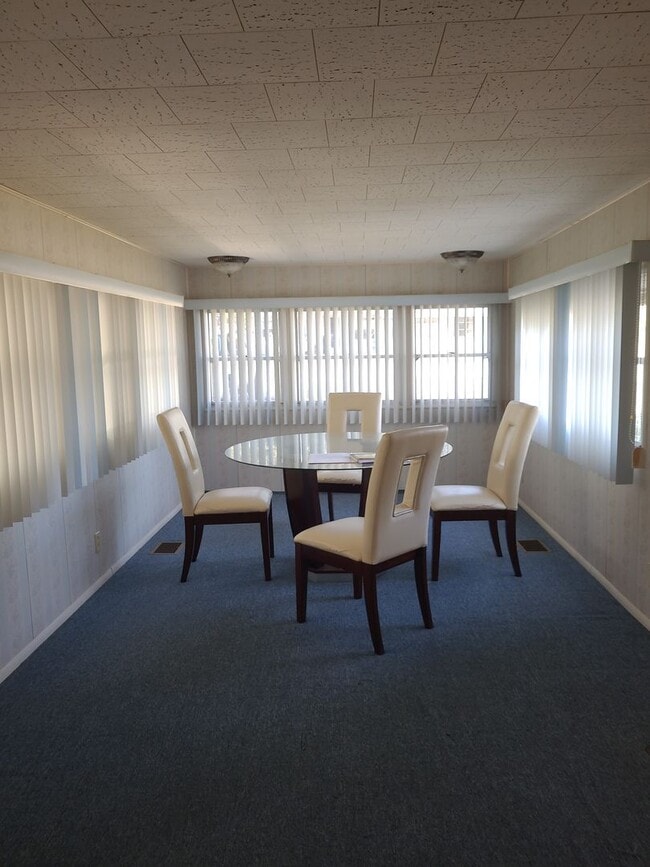 Photo - 55+ mobile home community. On canal to bea...