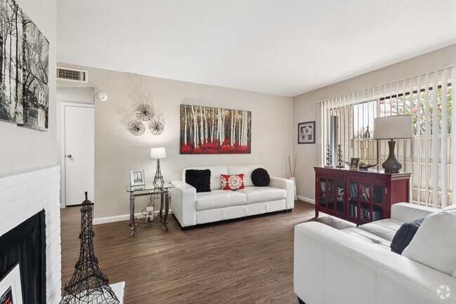 Apartamento B de 1 dormitorio y 1 baño - 690 pies cuadrados - Sala de estar - Waverly Apts