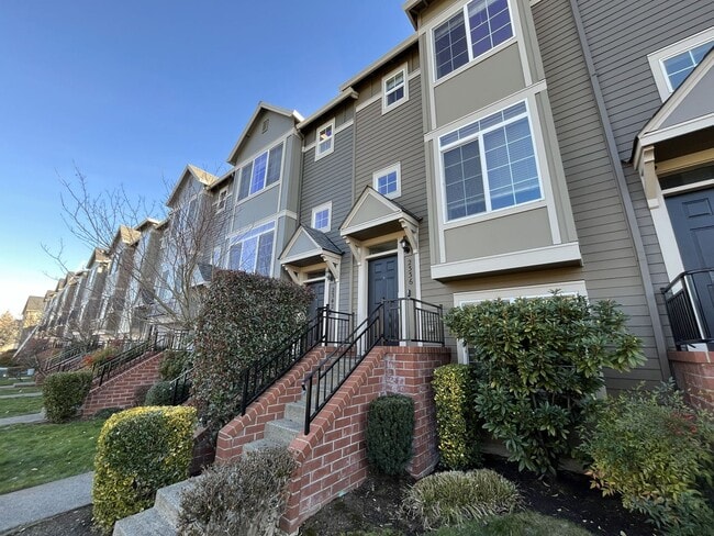 Building Photo - Bright 3-Level Townhome with Open-Concept Living, Built-In Fireplace & Included Wi-Fi