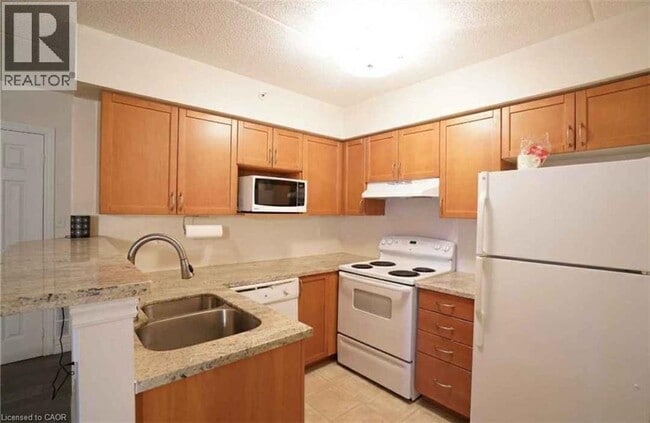 Photo - 1340 Main St E Unité 106