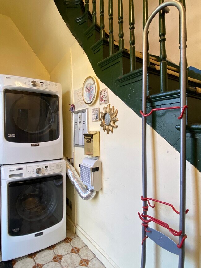 Entry level full-sized washer/dryer; bike rack.