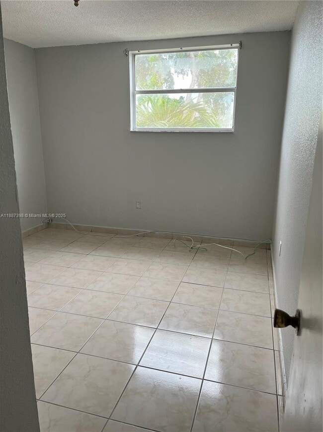 Photo - 666 W 81st St Unit 318