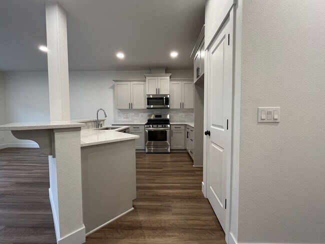 Photo - Modern 2022-Built 3-Bedroom Home with Open Layout, Entertainer’s Kitchen. Near Parks & Playgrounds