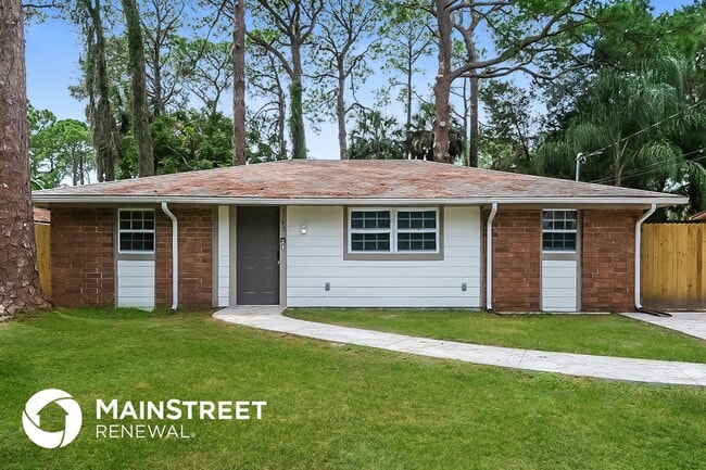 Building Photo - 7145 Pinewood Dr