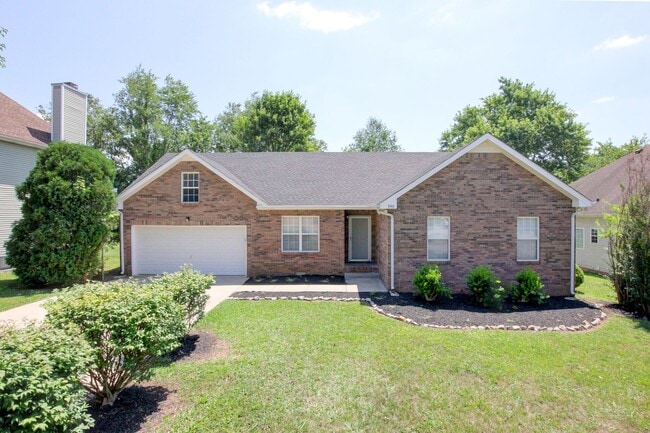 Building Photo - Stunning Brick Front Home With Fireplace And Hardwood Flooring In Sango Area