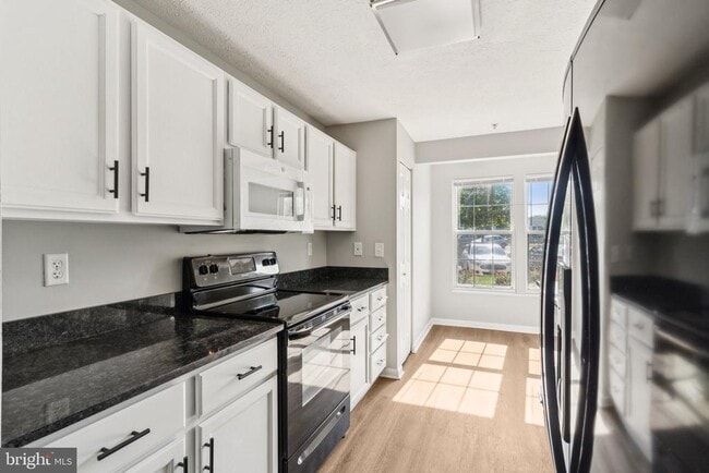 Building Photo - 699 Winding Stream Way Unit 104