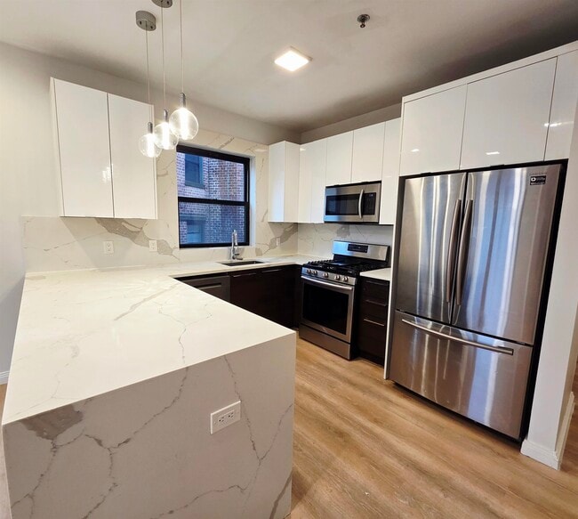 Photo - 6809 Palisade Ave Unit 201