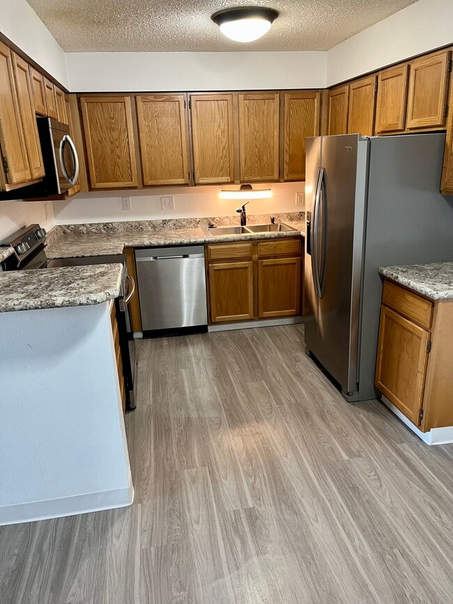 Photo - 410 Zang St Unidad 2-206