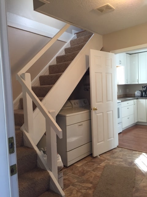 Nice landing area that leads to the back yard, washer and dryer hook ups are available as seen in the photo.