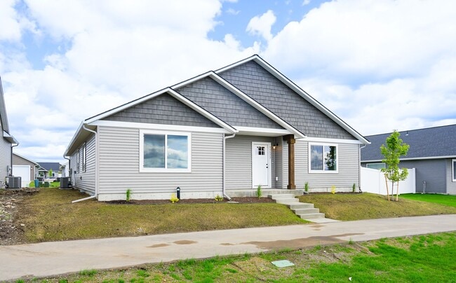 Photo - Newly built home with 3 car garage