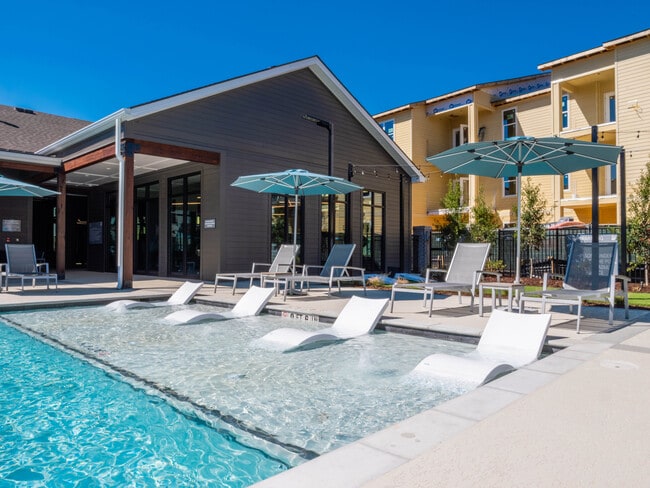 Resort Style Pool & Lounge Area - The Waters at McGowin Apartments