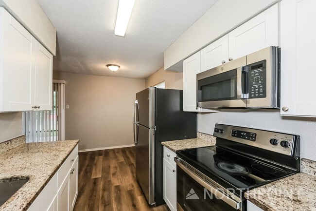 Photo - 4 BR/2BA | Newly Renovated Single Family Home | Covered Patio  | Fenced backyard!