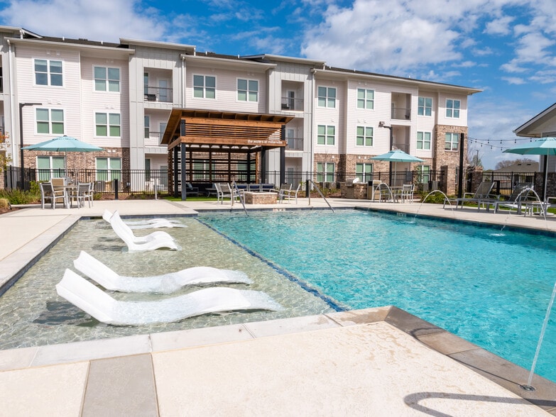 Resort-Style Pool with Baja Tanning Shelf